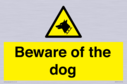 beware-of-the-dog-with-dog-warning-symbol~